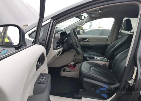 2023 Chrysler Pacifica Hybrid Touring L z USA, uszkodzony, nr VIN 2C4RC1L70PR604029